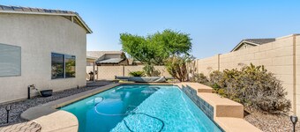 Spacious home with private heated pool with waterfall, putting green & firepit