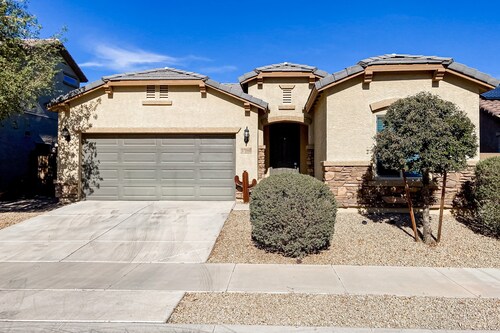 Single-story home with enclosed yard, private pool, hot tub, patio, & grill