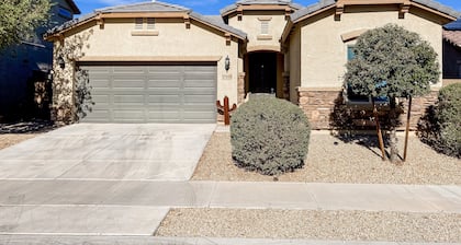 Single-story home with enclosed yard, private pool, hot tub, patio, & grill