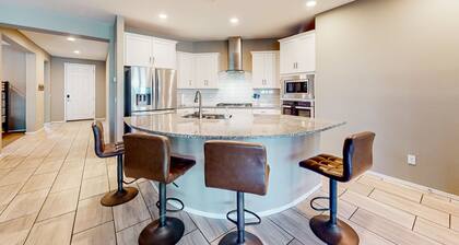 Single-story home with enclosed yard, private pool, hot tub, patio, & grill