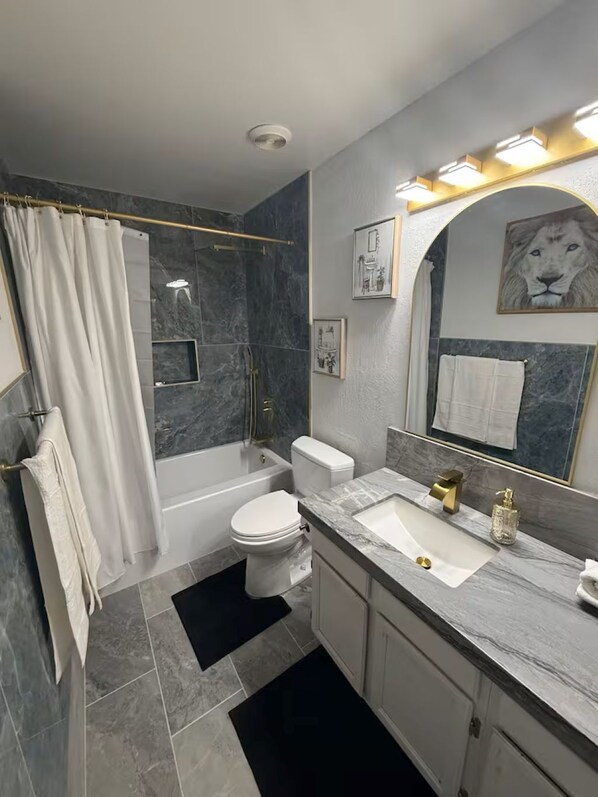 Shower, towels, soap, shampoo