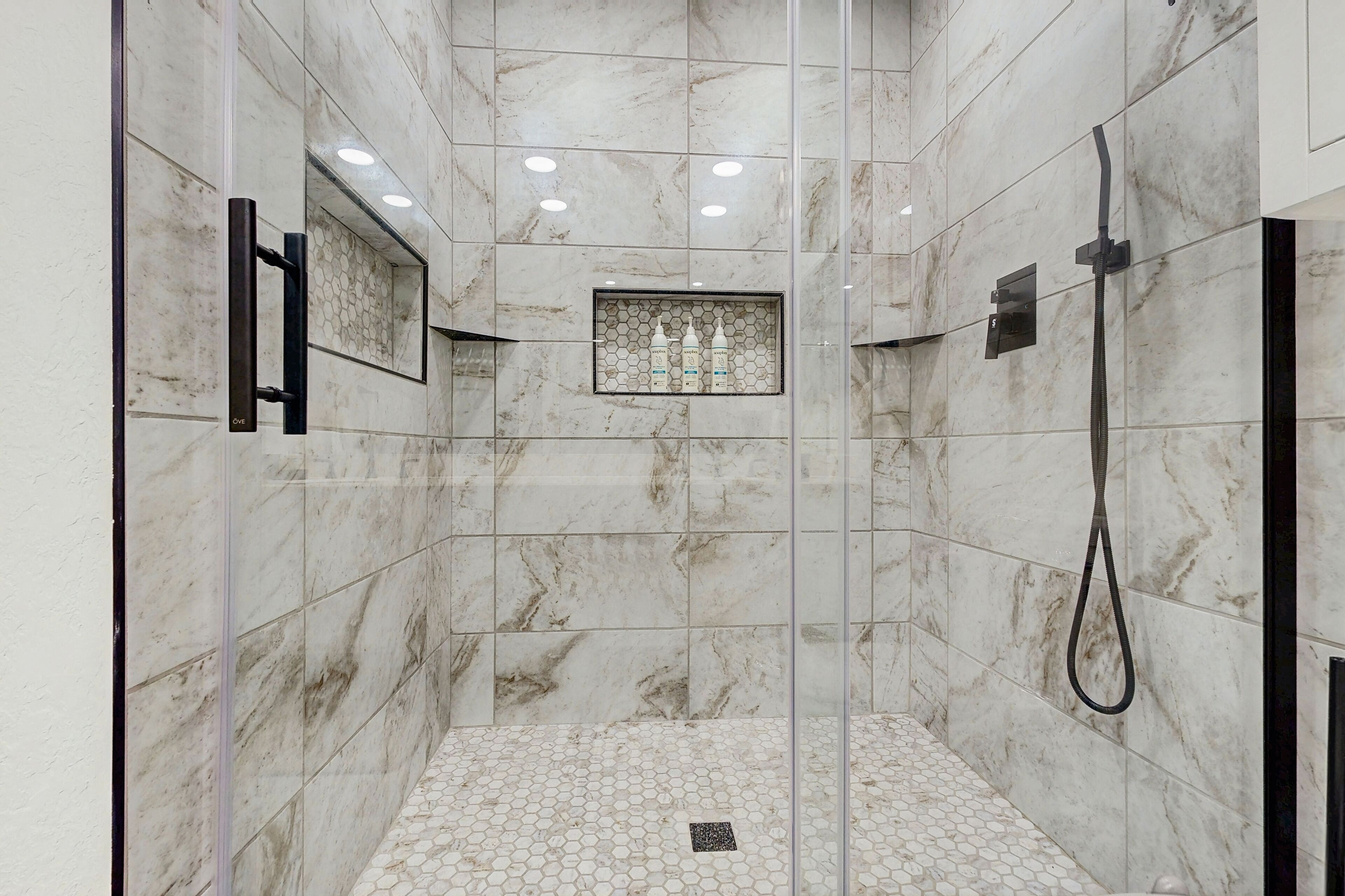 Shower, hair dryer, towels