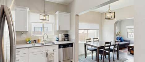 Coffee/tea maker, fridge, microwave, oven