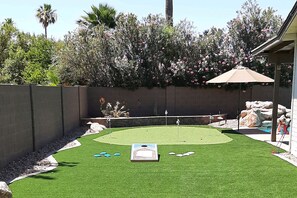 Property grounds - Dog-friendly home with enclosed yard, pool, putting green, grill, foosball, & AC (Scottsdale)