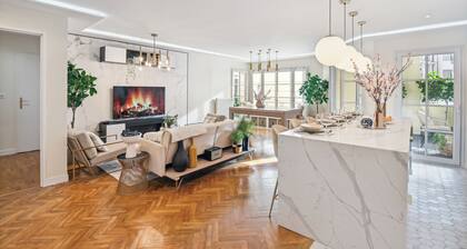 Family-friendly 3BR/2BA Courbevoie apartment w/ patio near La Défense metro stop