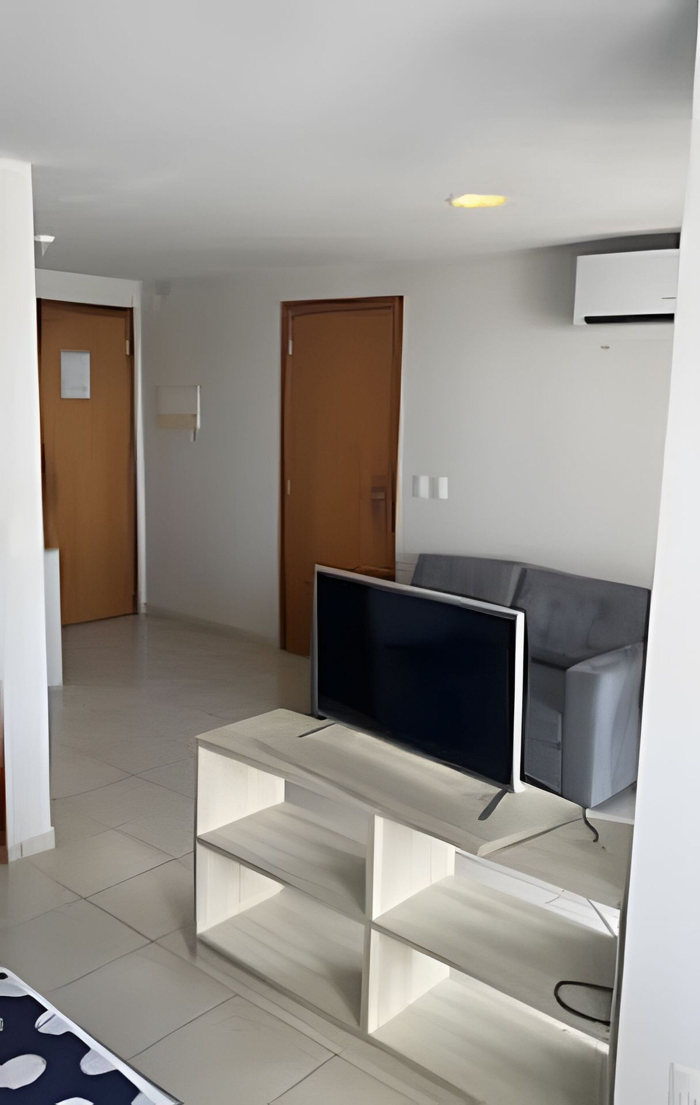Apartamento conforto | Área de estar | TV