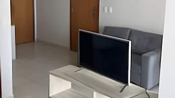 Apartamento conforto | Área de estar | TV