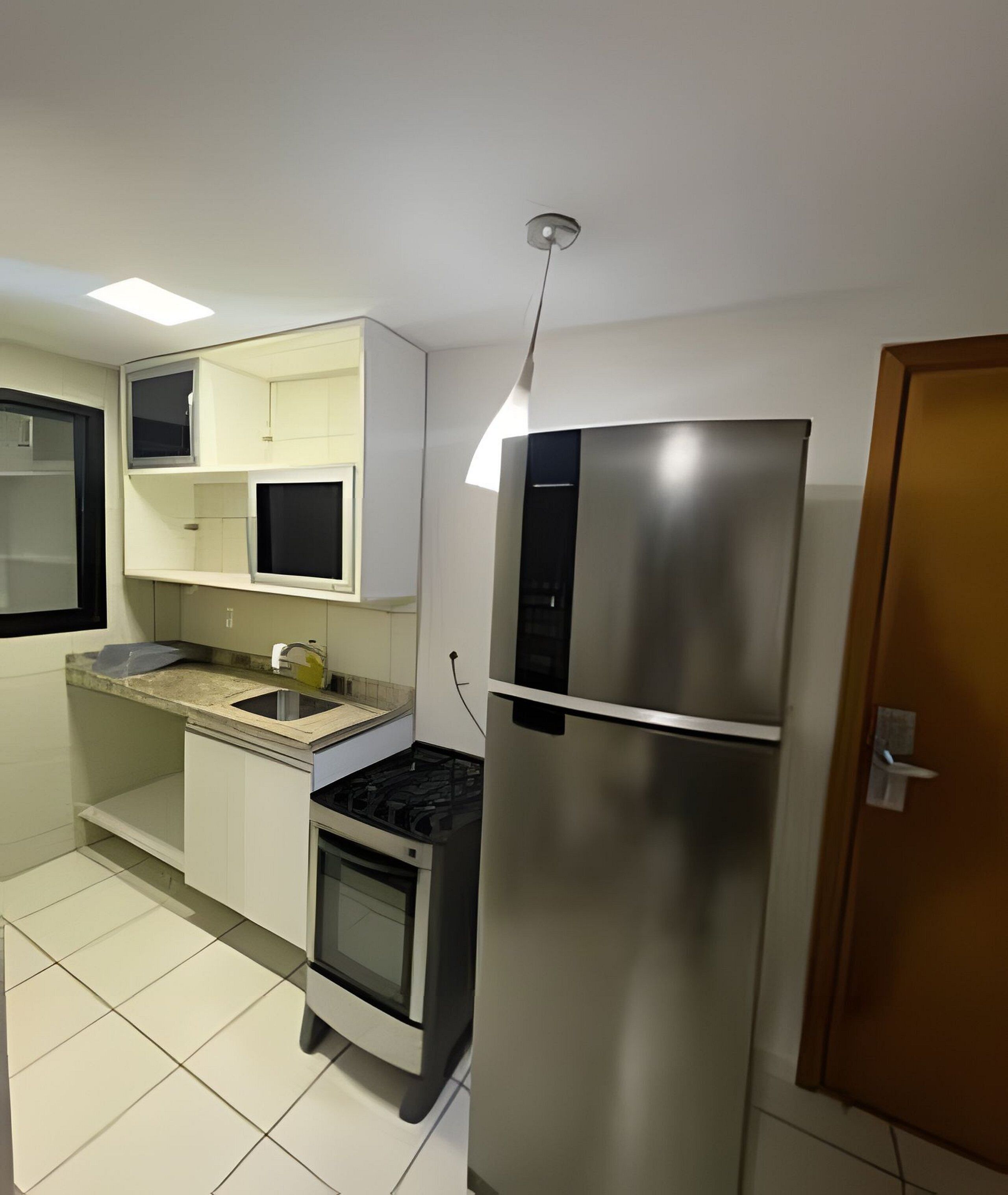 Departamento Confort | Cocina privada | Refrigerador 