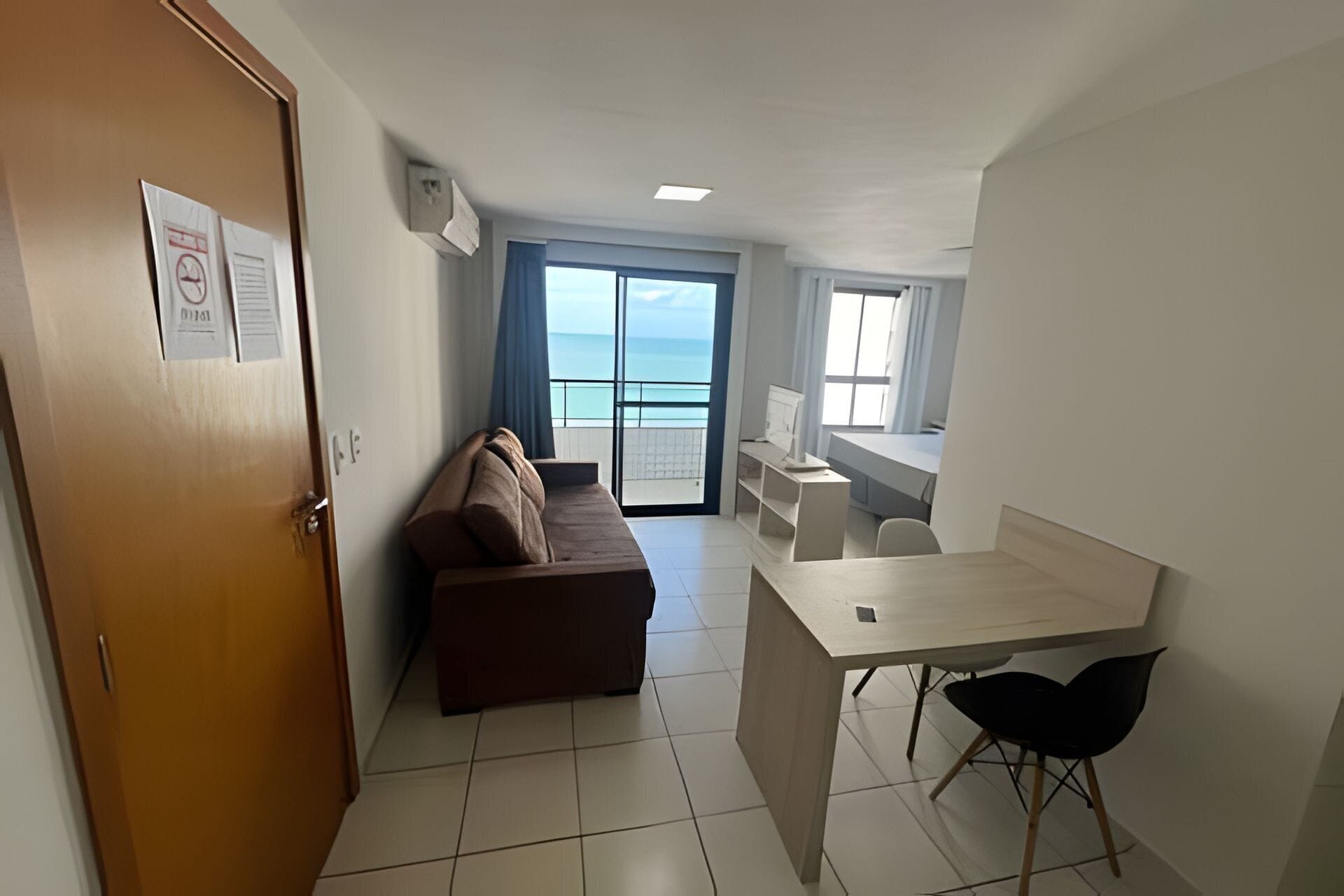 Apartamento conforto | Área de estar | TV