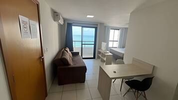 Apartamento conforto | Área de estar | TV