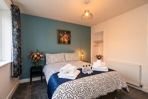 2 bedrooms, desk, iron/ironing board, travel cot