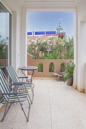 Terrace/patio - Ocean Breeze 2BR Escape – Walk to the Waves! (Tiznit Province)