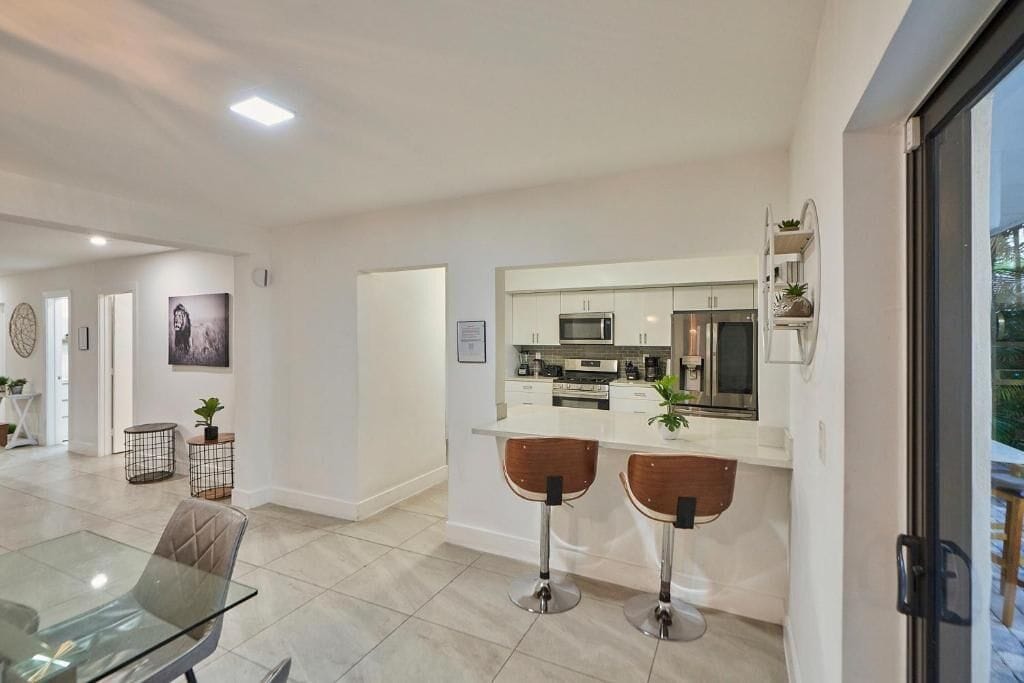 Comfort-rum - uteplats - utsikt mot trädgården | Eget kök