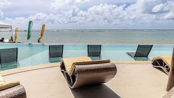Outdoor pool, pool umbrellas, pool loungers
