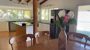 Shared Dormitory, 2 Bedrooms, Patio | Dining room