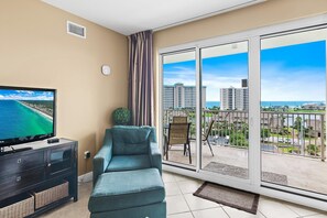 A balcony with a view of a cityscape and ocean. - Ariel Dunes II 607 (Miramar Beach)