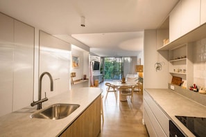 Fridge, microwave, oven, stovetop - Byron Vibes - Luxury Couples Apartment in Jonson Lane, Byron Bay + Rooftop Pool (Byron)