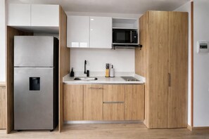 Private kitchen - Modern Apartment in Parque de la 93 Bogotá - 1 Bedroom (Bogotá)