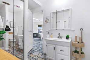 Shower, hair dryer, towels