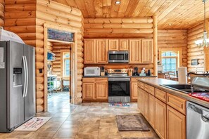 House, Multiple Beds, Hot Tub (LAKE Liberty Pines) | Private kitchen - Liberty Pines - Lakefront Log Home, Swim Spa & Game Room (Moneta)