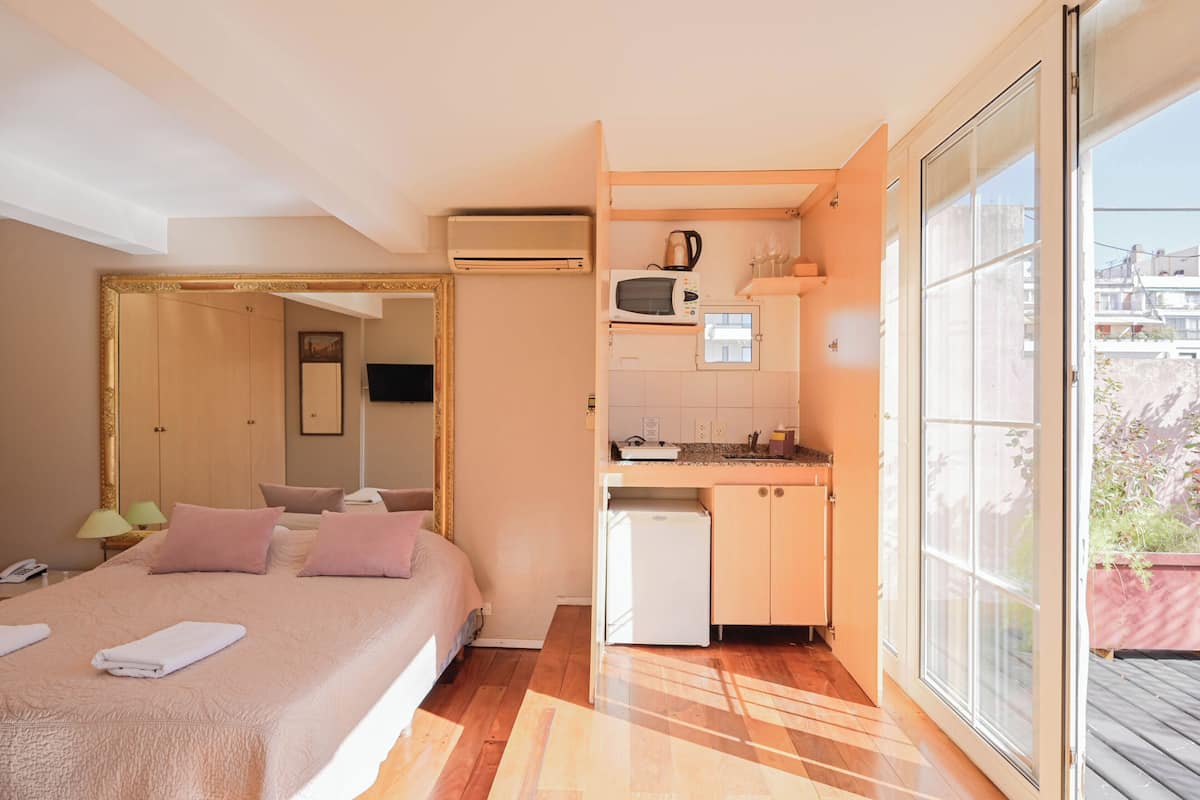 Executive Apartment, City View | In-room safe, desk, laptop workspace, blackout drapes