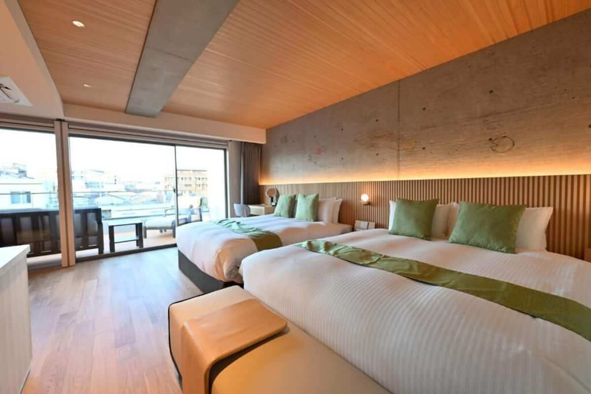 Premier Quadruple Room, Balcony, Sauna | In-room safe, desk, blackout curtains, iron/ironing board