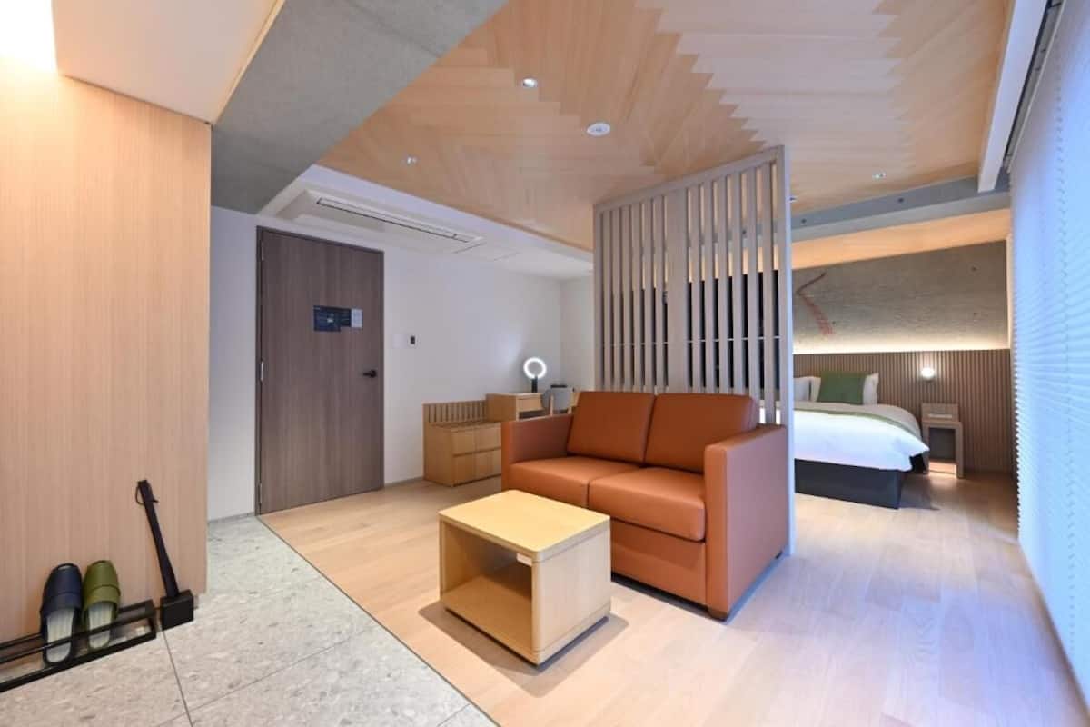 Deluxe Double Room, Sauna | In-room safe, desk, blackout curtains, iron/ironing board