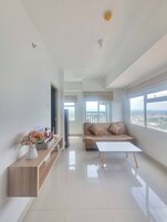Estudio Deluxe, vistas a la ciudad | Zona de estar