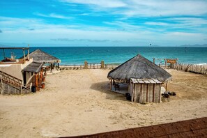 On the beach, sun-loungers - New Beachfront Suites 2nd Floor Complete Beachfront, Beautiful Ocean View (El Sargento)