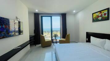 Quarto premier, 1 quarto, sacada, vista parcial para o mar | Wi-Fi de cortesia