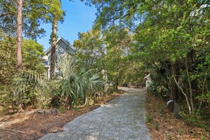 Property grounds - "Slow Your Roll" is a pet-friendly, five-bedroom, 4.5-bath Maritime Forest (Bald Head Island)