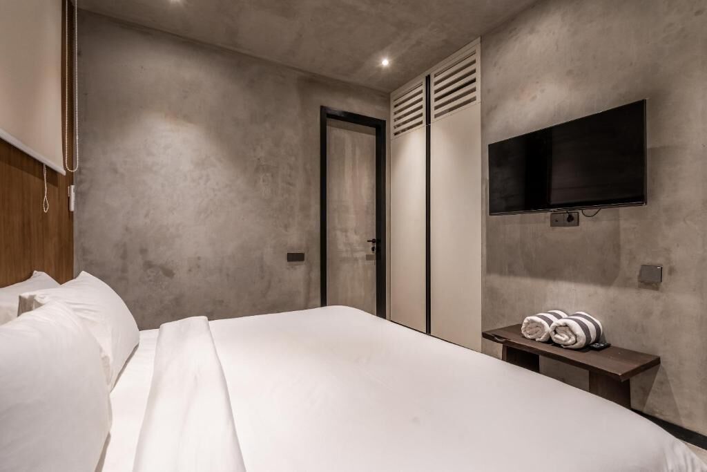 Appartement Deluxe, balcon | Coffres-forts dans les chambres, rideaux occultants