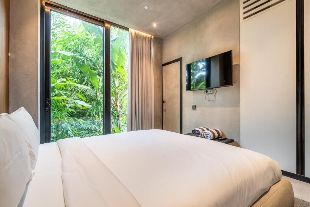 Appartement Deluxe, balcon | Coffres-forts dans les chambres, rideaux occultants