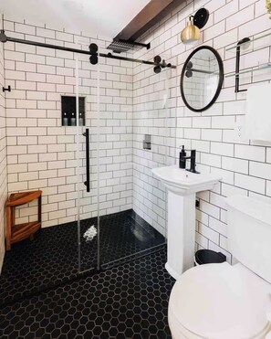 Shower, hair dryer, towels, soap