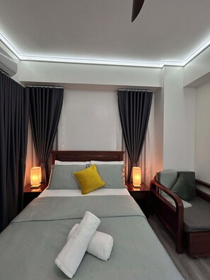 1 bedroom, iron/ironing board, WiFi, bed sheets - Enjoyable condo with AC in vibrant Davao City (Davao City)