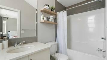 Hair dryer, towels, soap, shampoo