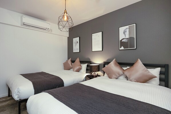 Appartement, 3 chambres, non-fumeur | Rideaux d’obscurcissement, système d’insonorisation