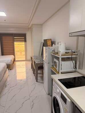 Family Double Room, Balcony | In-room safe, blackout drapes, free WiFi - OYUSTAY Clark condo near airport casino (Mabalacat City)