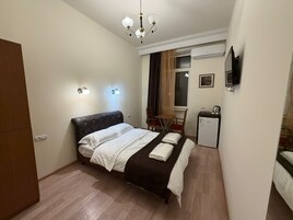 Classic Double Room, Lanai, City View | Desk, free WiFi, bed sheets