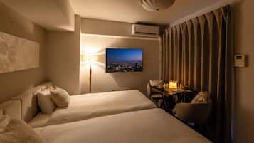 Desk, laptop workspace, blackout curtains, iron/ironing board