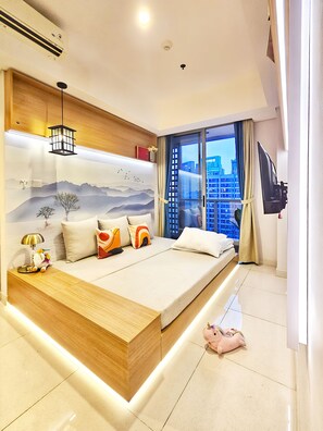 Apartment, 2 Bedrooms, City View | Living area | 43-inch Smart TV with cable channels - Keio By SanLiving - 2BR - HubLife Mall (Jakarta)