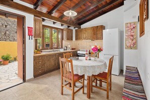Fridge, microwave, oven, stovetop - Charming Villa in a traditional village, 3 km from the beach of Agios Gordios (Kouramades)