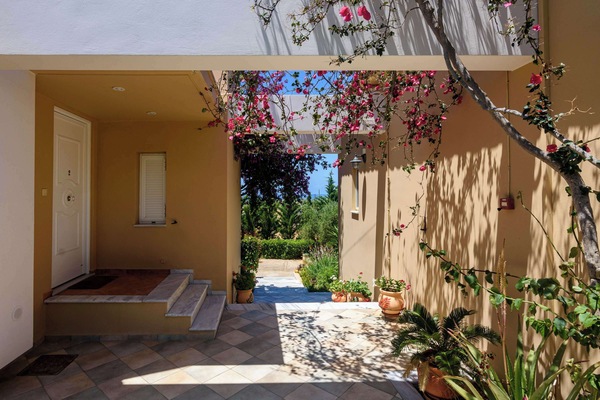 Private Entrance Patio with Shaded Seating Area