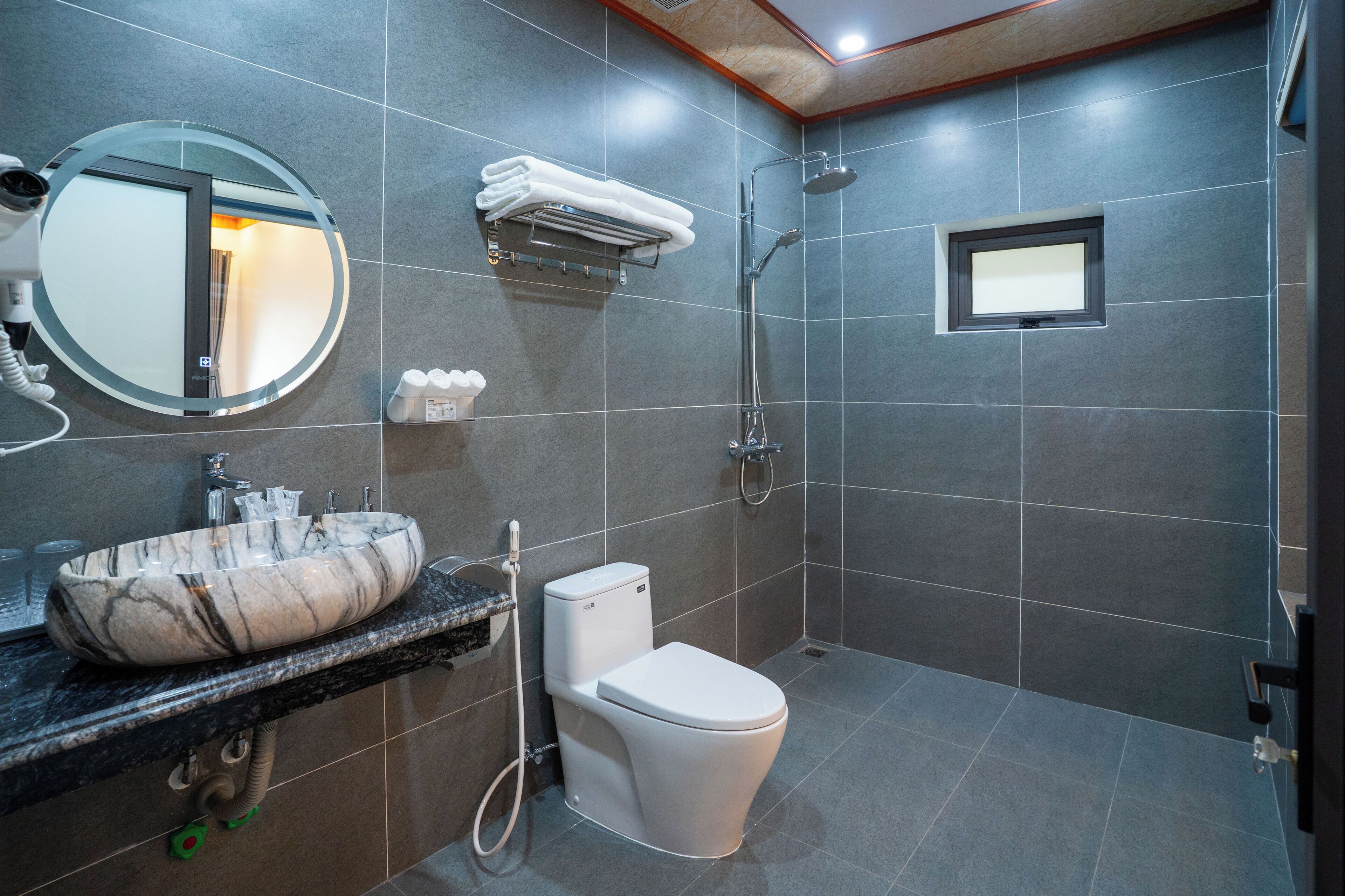 Shower, hair dryer, towels, soap
