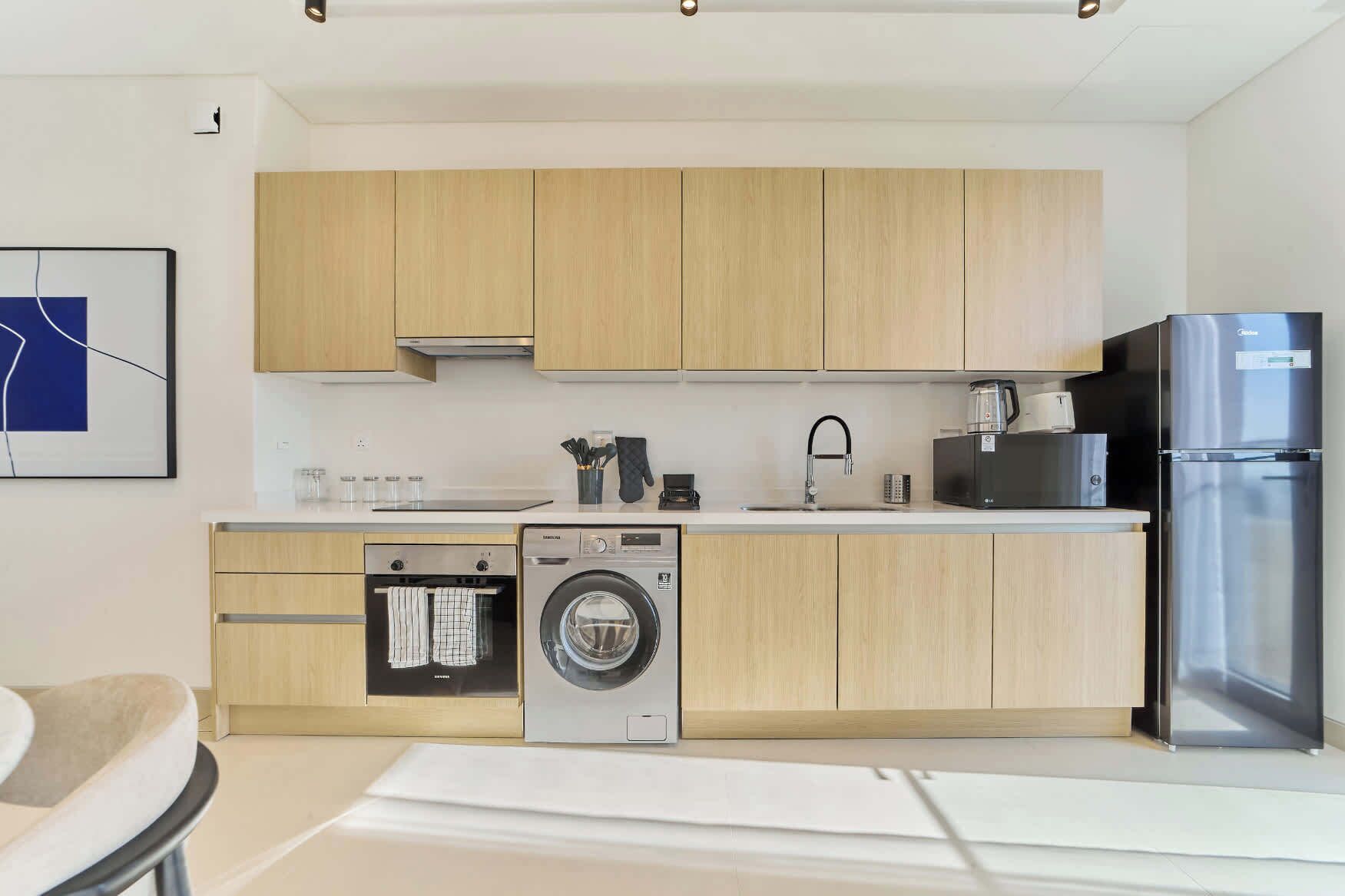 Coffee/tea maker, fridge, microwave, oven