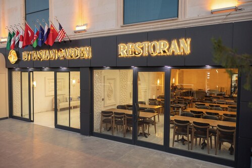 BY TASHAN GARDEN OTEL