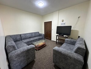 Familie appartement, uitzicht op stad | Woonruimte