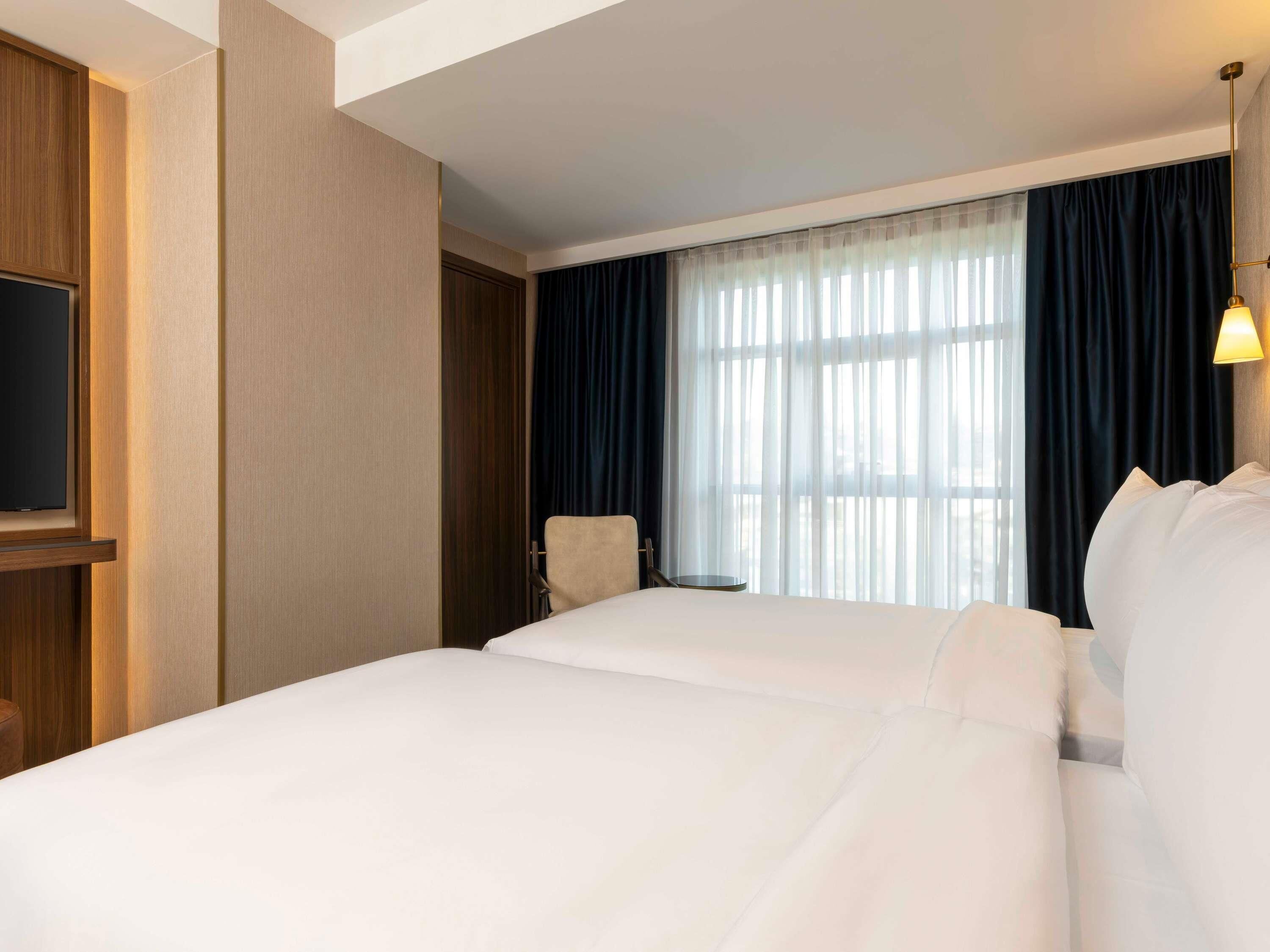Superior Room, 2 Single Beds | Free minibar items, in-room safe, blackout curtains, rollaway beds