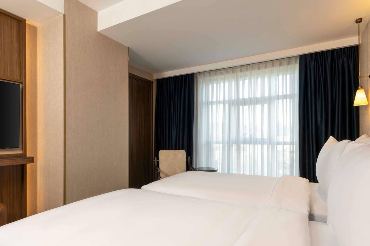 Superior Room, 2 Single Beds | Free minibar items, in-room safe, blackout curtains, rollaway beds