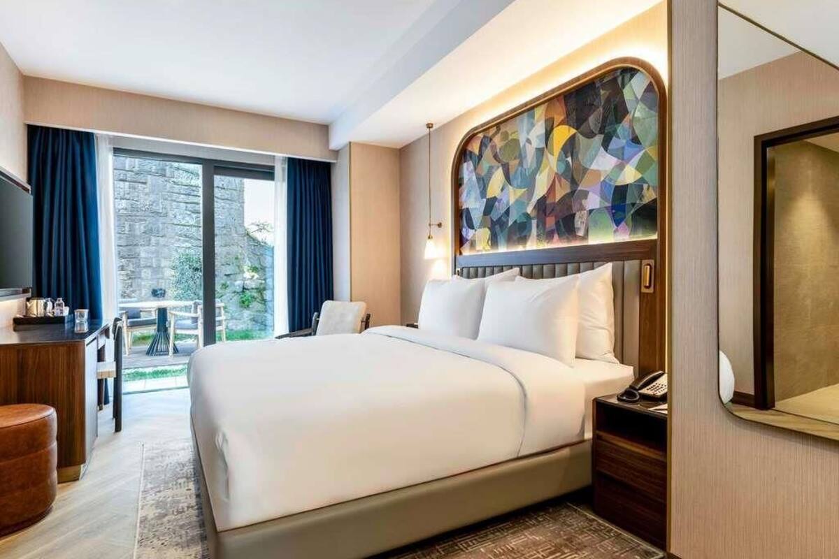 Classic Room, 1 Double Bed, Patio | Free minibar items, in-room safe, blackout drapes, rollaway beds